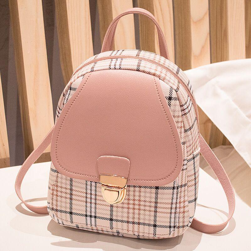 Experience Casual Chic with Our Ladies Check Lock Small Backpack! ππΈ