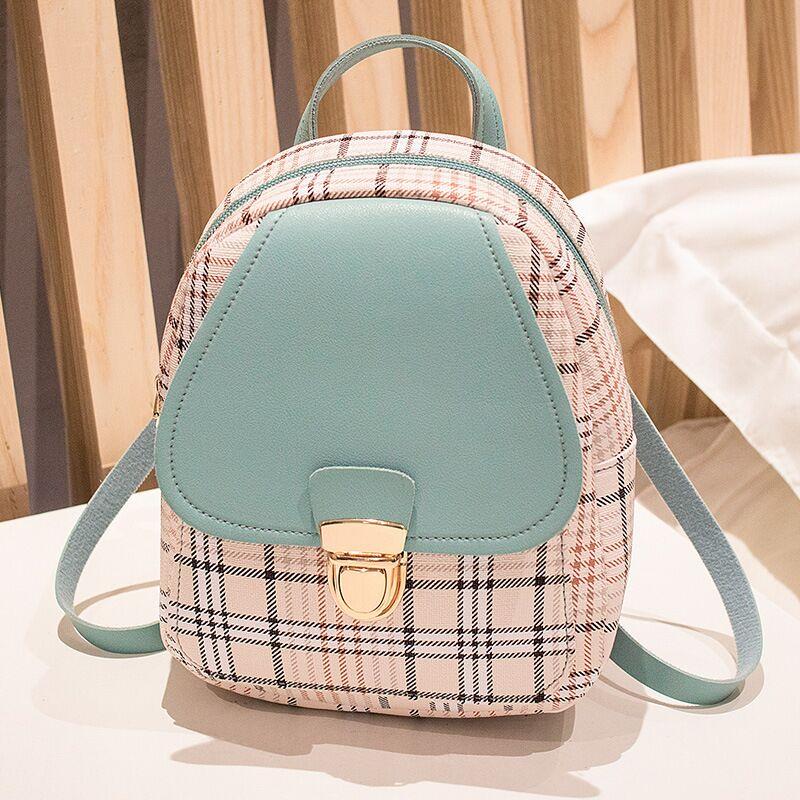 Experience Casual Chic with Our Ladies Check Lock Small Backpack! ππΈ