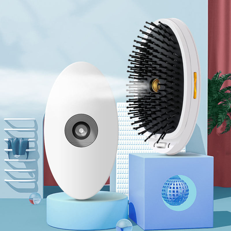Peine de peluquería de iones de pulverización portátil con vibración eléctrica
