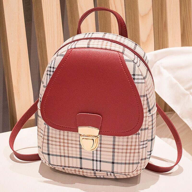 Experience Casual Chic with Our Ladies Check Lock Small Backpack! ππΈ