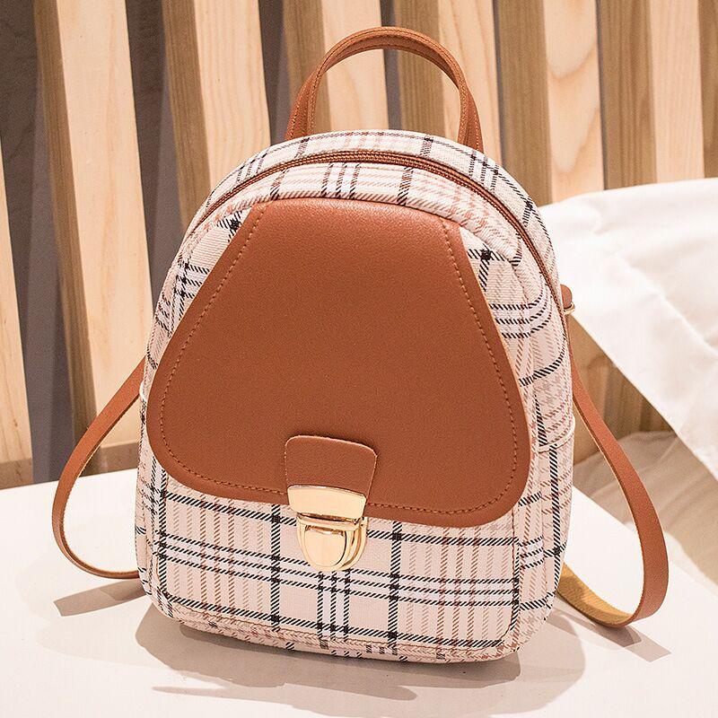 Experience Casual Chic with Our Ladies Check Lock Small Backpack! ππΈ