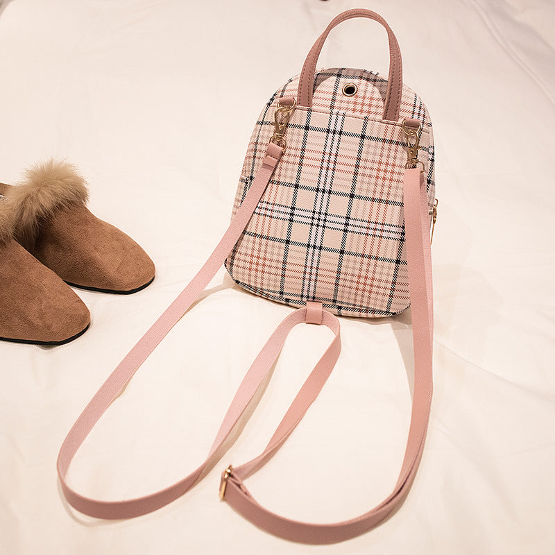 Experience Casual Chic with Our Ladies Check Lock Small Backpack! ππΈ
