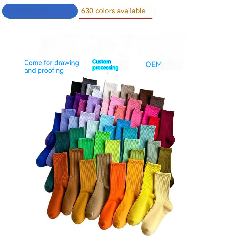 Calcetines coloridos de procesamiento de algodón peinado hasta media pantorrilla de macarrón