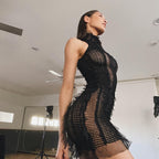 ¡Prepárate para llamar la atención con nuestro vestido de cuello alto transparente Wispy de moda de verano! 🌟👗