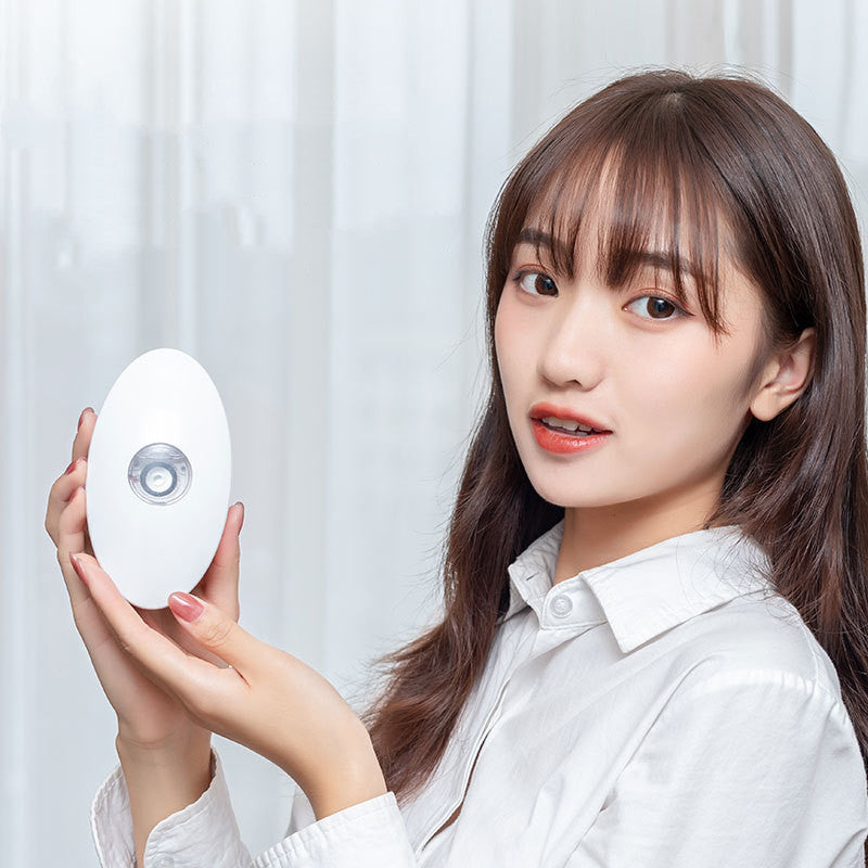 Peine de peluquería de iones de pulverización portátil con vibración eléctrica