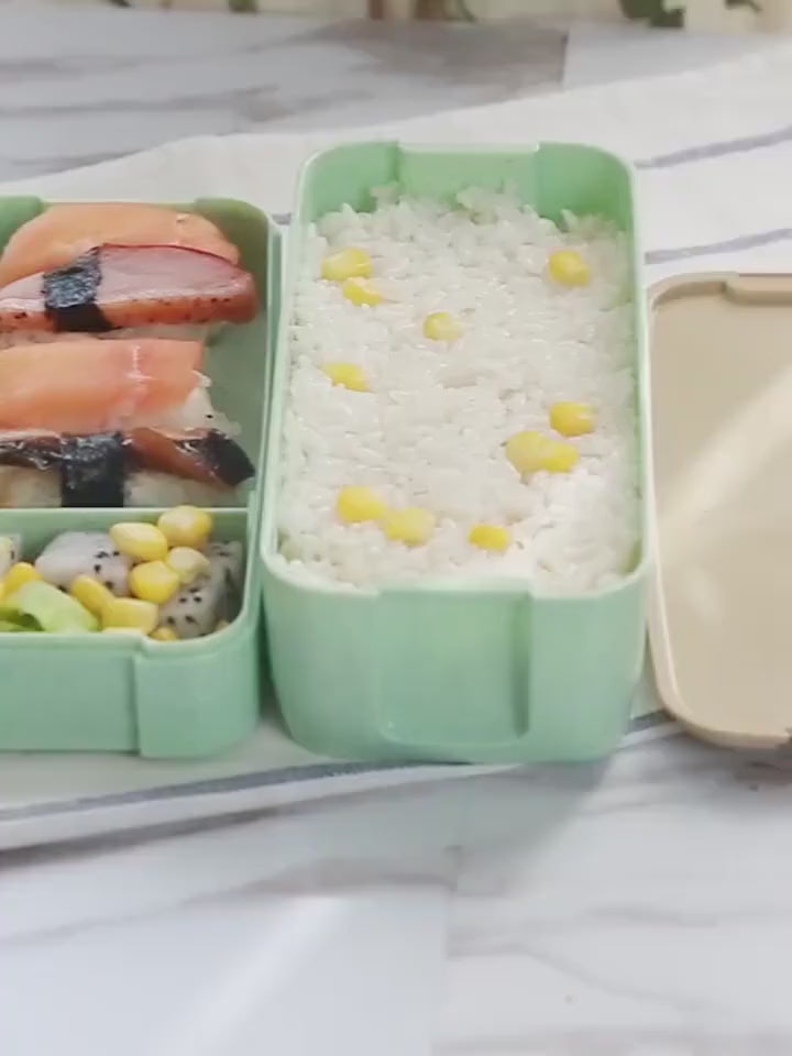 Presentamos nuestra lonchera ligera separada para horno de microondas: ¡su compañera perfecta para comidas saludables mientras viaja! 🍱🌟